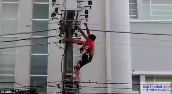 Photos: Man Gets Electrocuted After Climbing An Electric Pole To Entertain People At A Political Rally